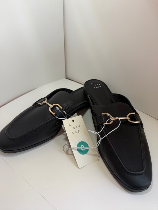 a new day Shoes - NWT a new day Black Leather Backless Loafers with Gold Chain Accent